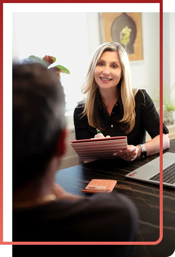 Julianna standing infront of building entrance.
